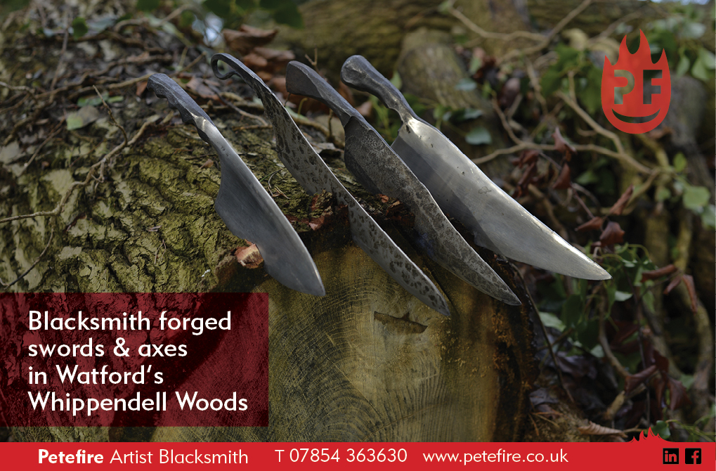 Blacksmith forged large kitchen knives, cutting into log, Whippendell Woods, Watford