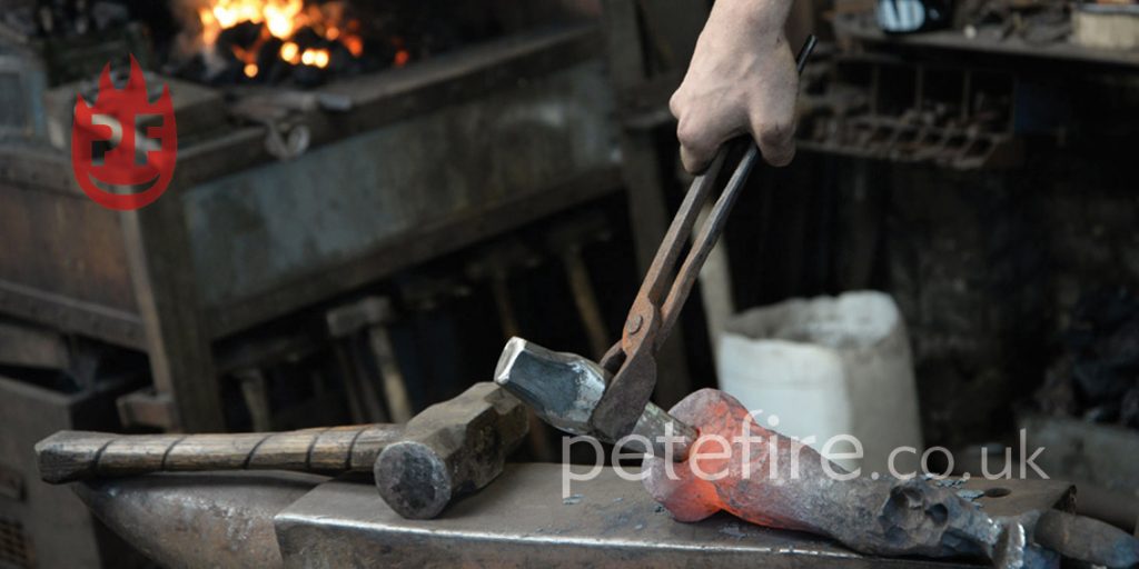 Blacksmith forging at the Petefire forge in Herts