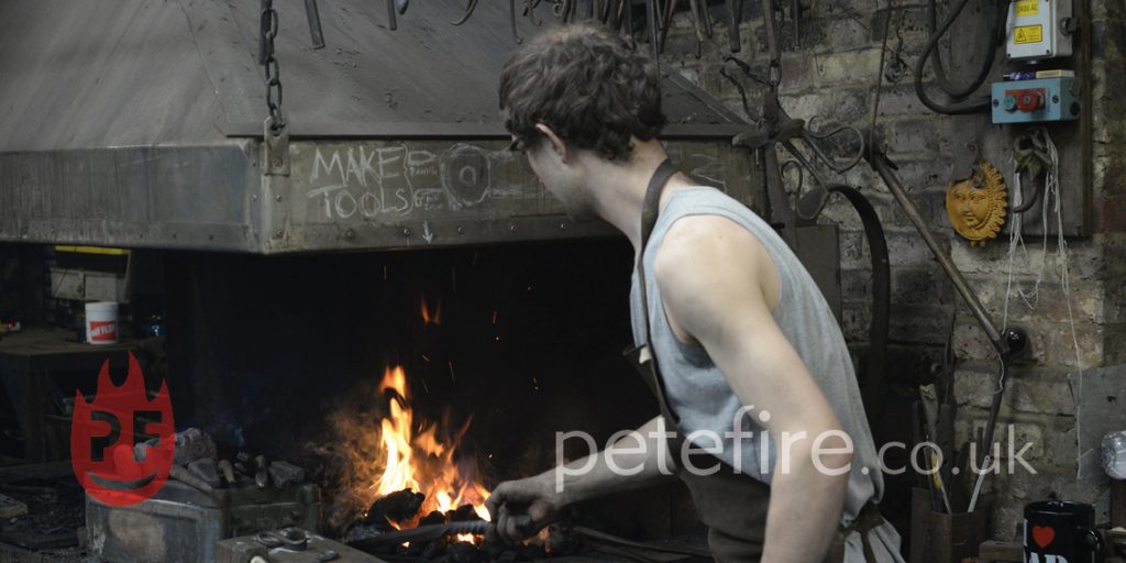 Blacksmith forging at the Petefire Blacksmith forge in Hertfordshire