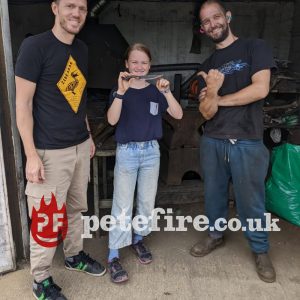 Petefire Blacksmith Forging Experience, children welcome, girl and dad with hand forged knife