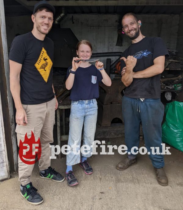 Petefire Blacksmith Forging Experience, children welcome, girl and dad with hand forged knife